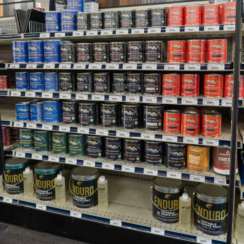 Shelves of paint cans in store