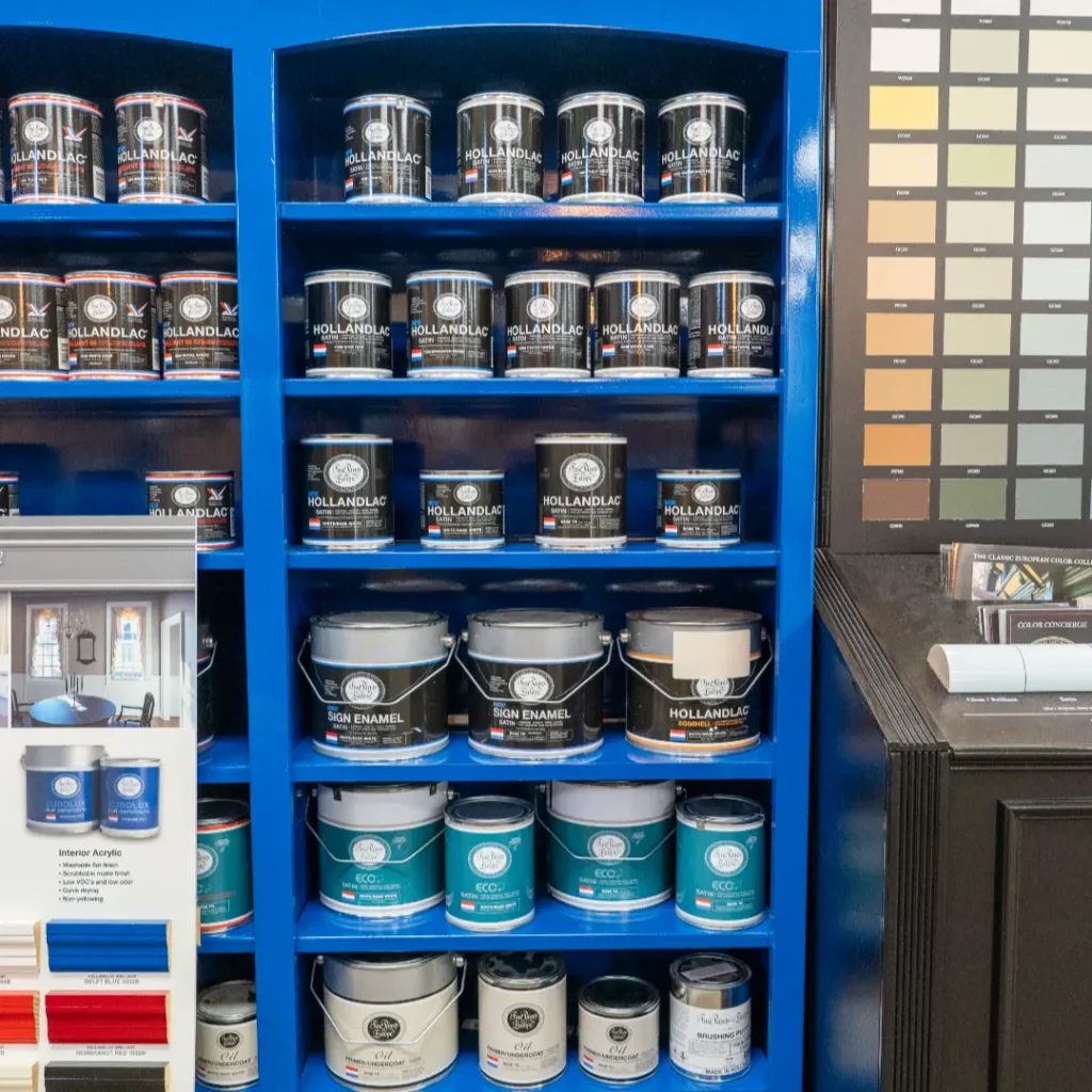 shelves of paint cans in store